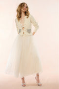 Cream wool-blend cardigan with heart sequin pockets, button front, long sleeves
