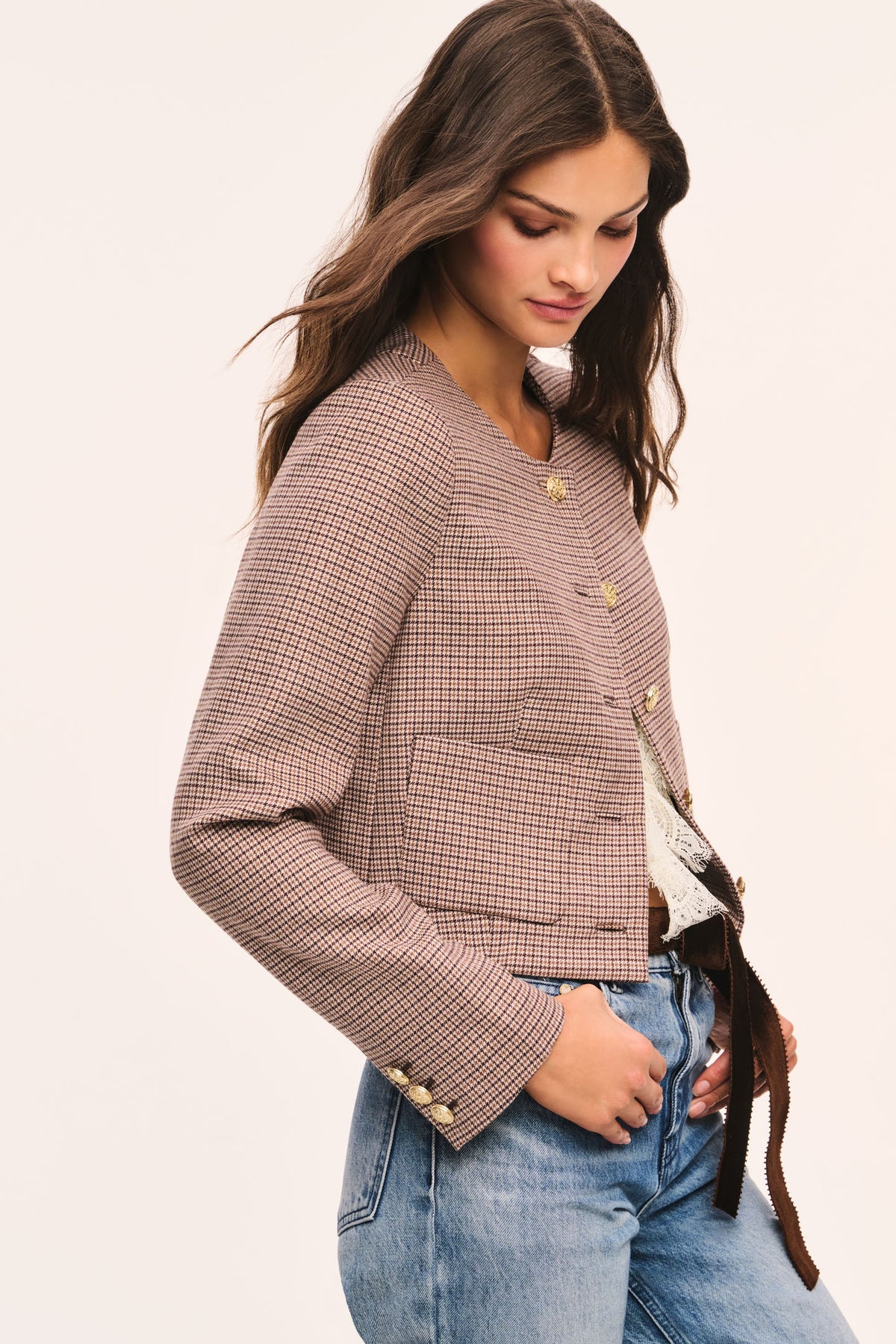 Brown and beige cropped checkered jacket side view: gold-tone button front and patch pockets