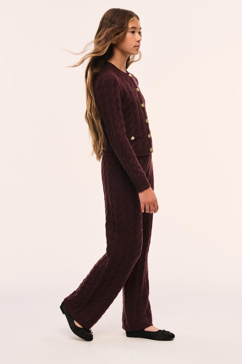 Tween shalley pants, dark maroon wide-leg with side seam detail, side view.