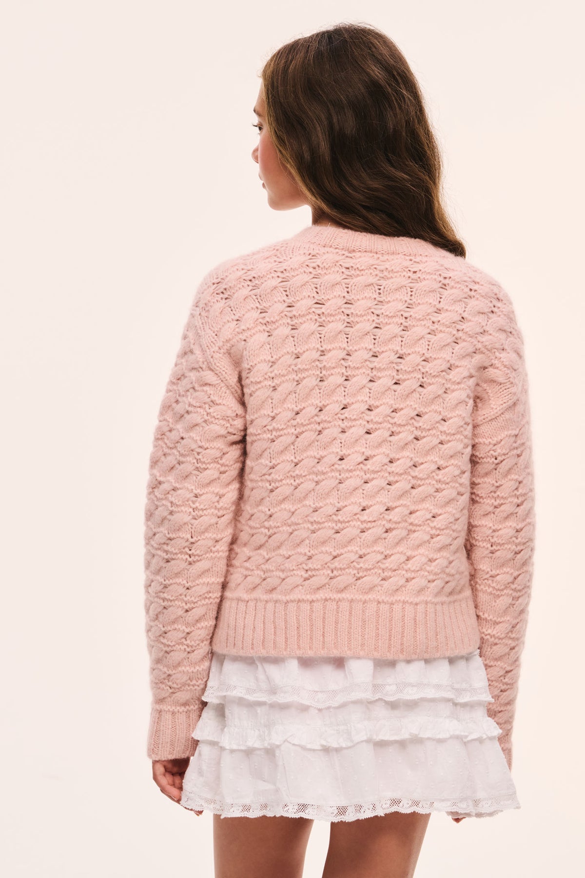 Tween pink textured knit pullover, ribbed hem and cuffs, back view