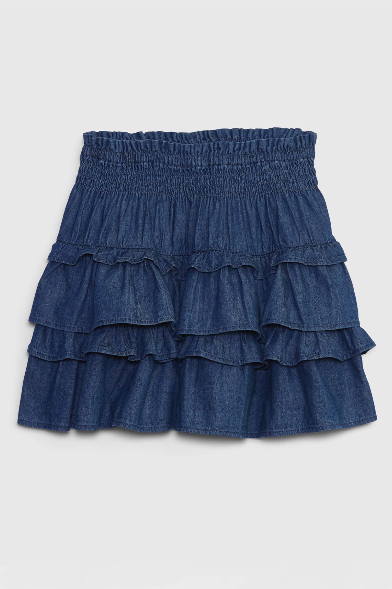 Kids denim ruffle mini skirt with smocked waist and ruffle skirt