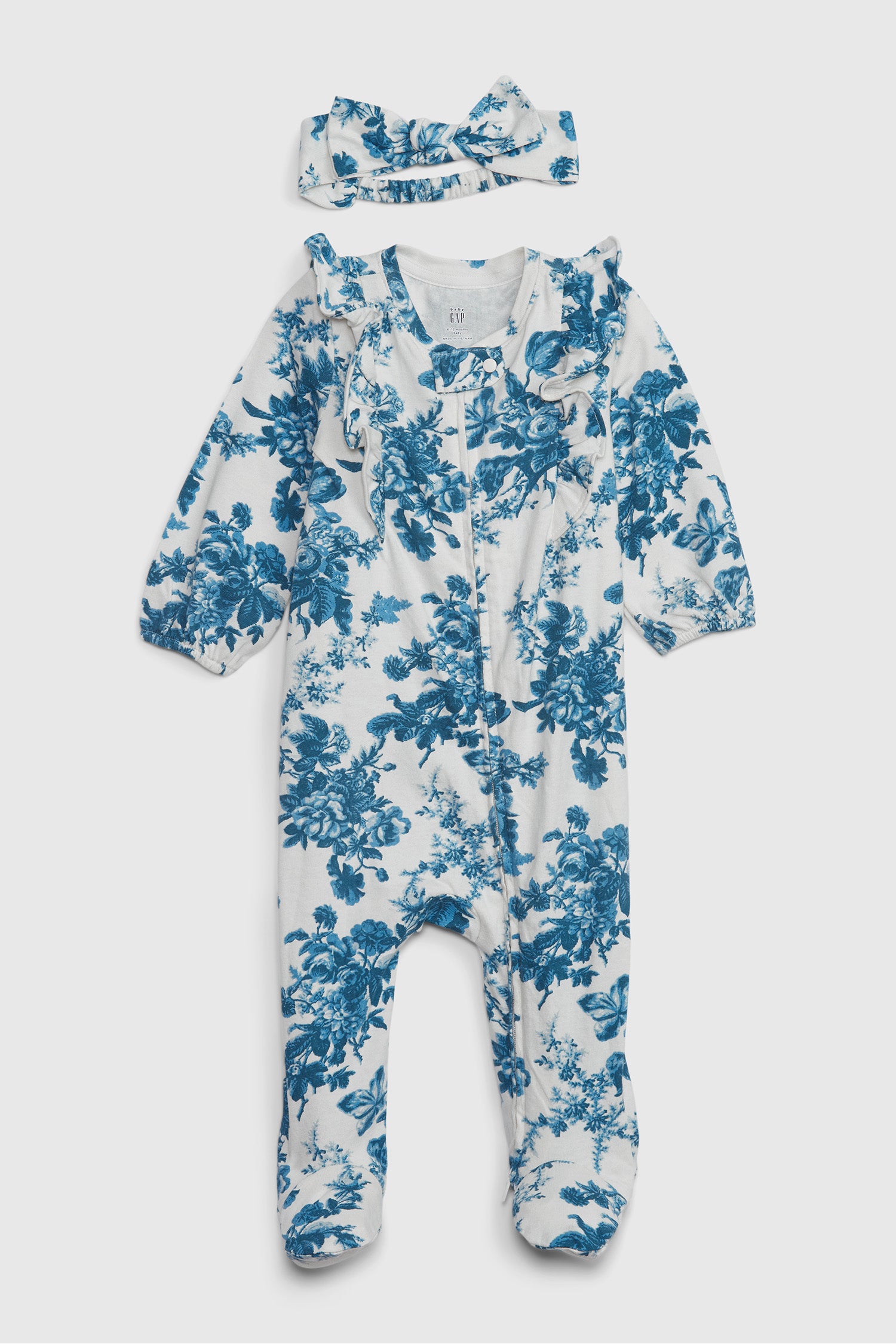 Baby's blue floral onesie.