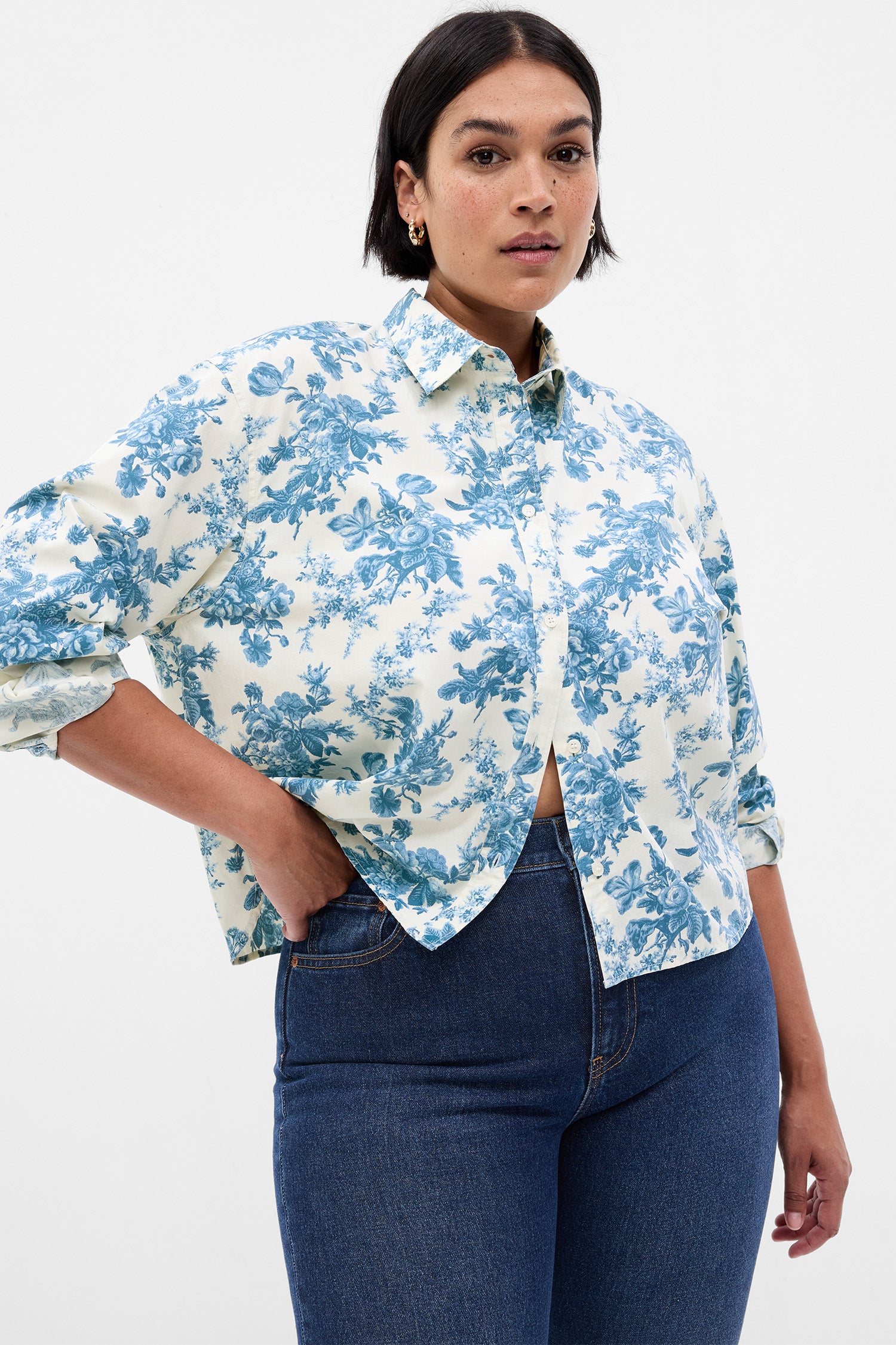Model wearing blue and white floral collared crop shirt