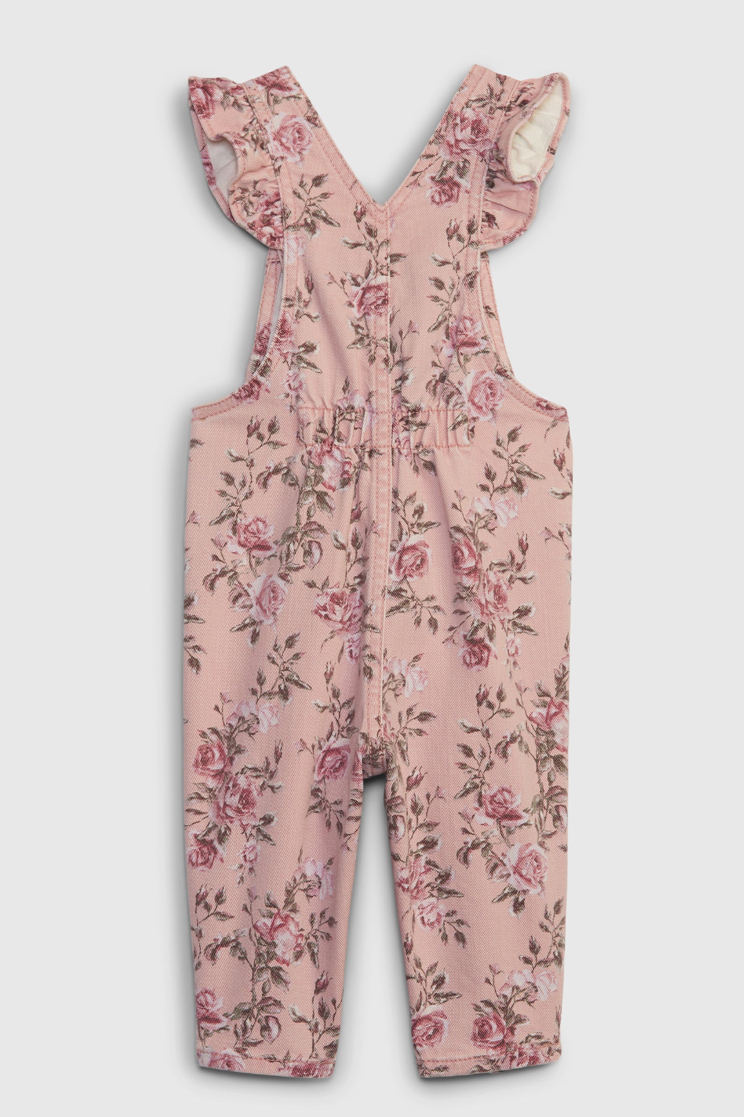 Image showing back of baby's pink floral denim overalls