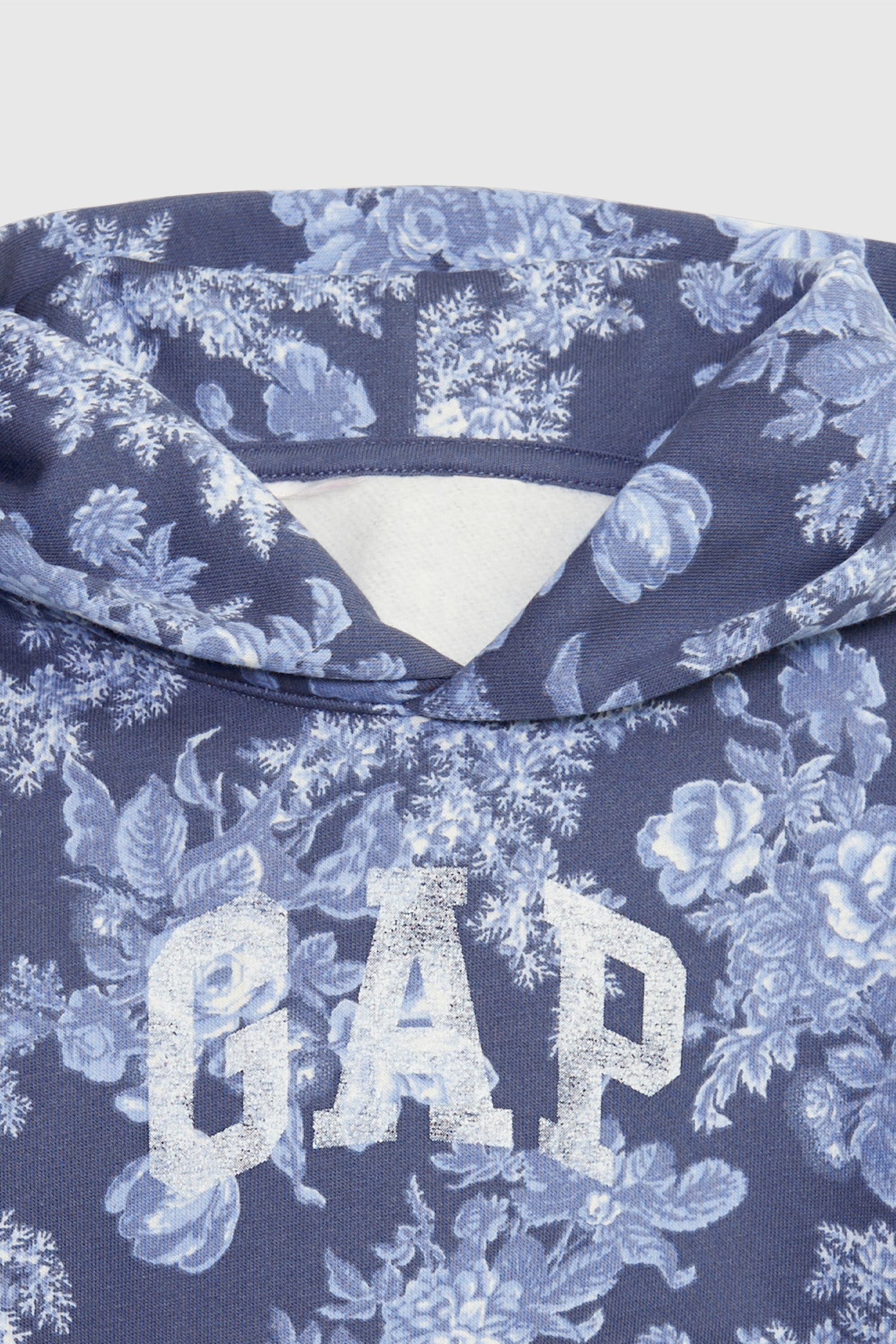 Close up image detailing GAP logo on boy's toddler floral hoodie