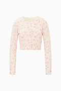Floral patterned sweater on a white background