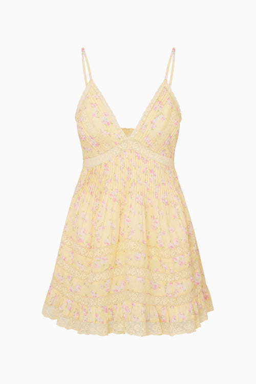 Yellow floral dress on a white background