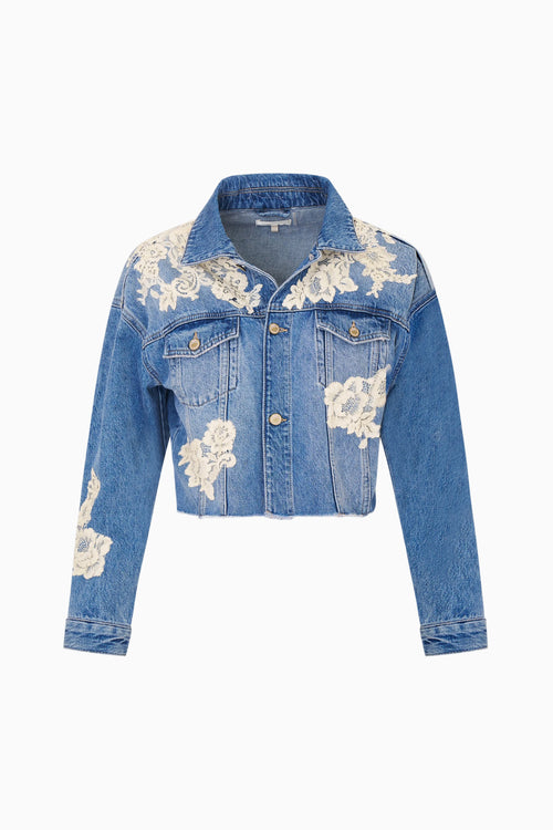 Blue denim jacket with floral lace embroidery on a white background