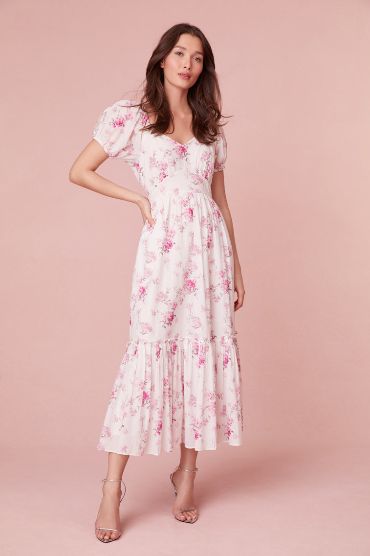 Dress with puffed sleeves and full skirt in pink floral print