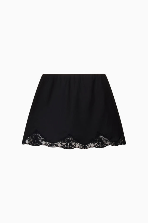 Black lace-trimmed skirt on a white background
