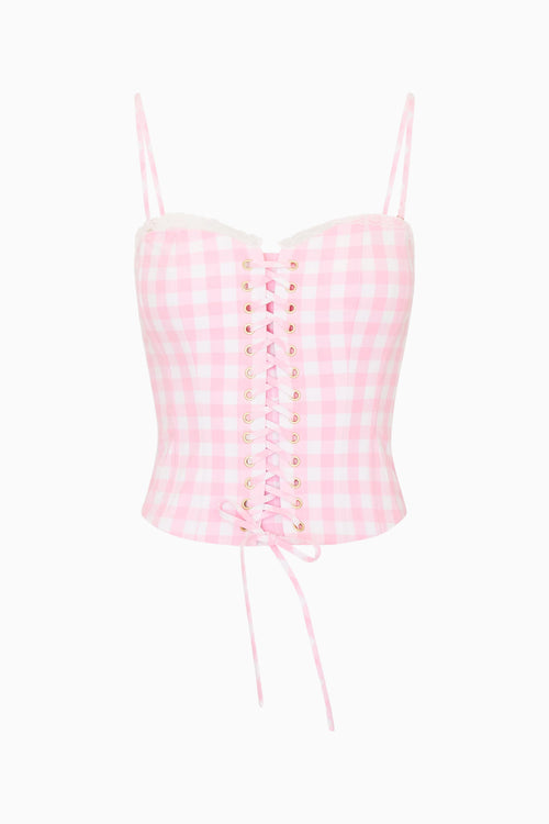 Pink gingham corset top on a white background
