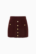 Berritt burgundy mini skirt with gold buttons down the front and on faux front pockets
