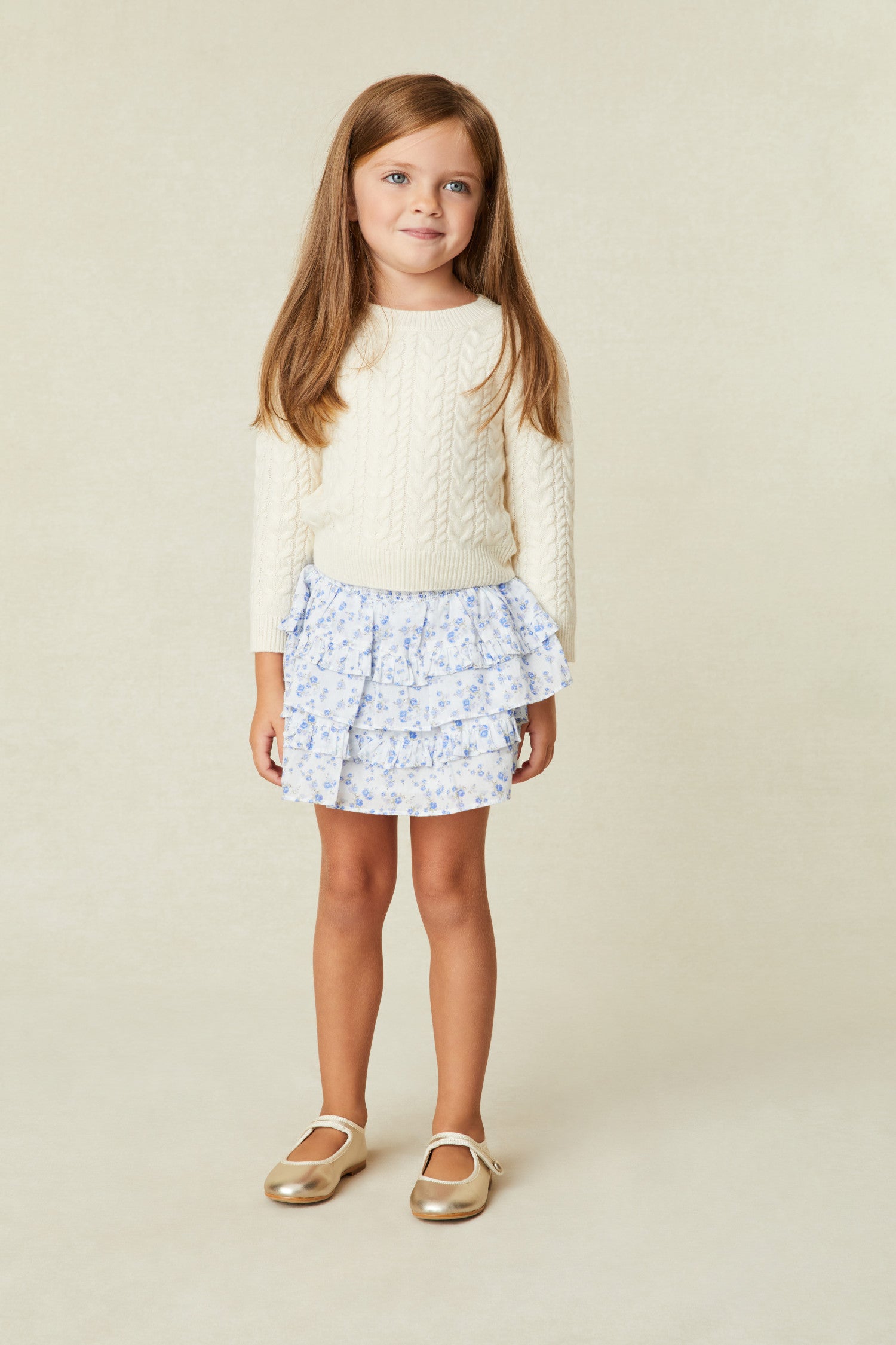 Girls white skirt with tiny blue flowers - wide smocked waistband, the skirt falls to two shirred tiers with ruffle details.