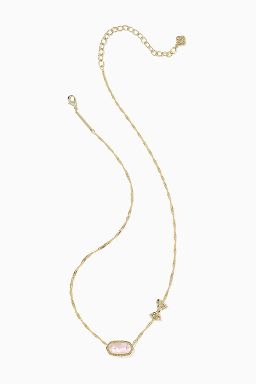 Gold necklace with a pink pendant on a white background