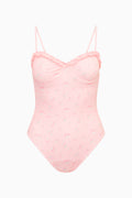 Pink lace-trimmed one-piece swimsuit on a white background