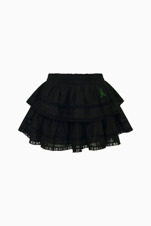 Black tiered skirt with lace trim on a white background