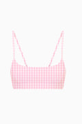Pink gingham sports bra on a white background