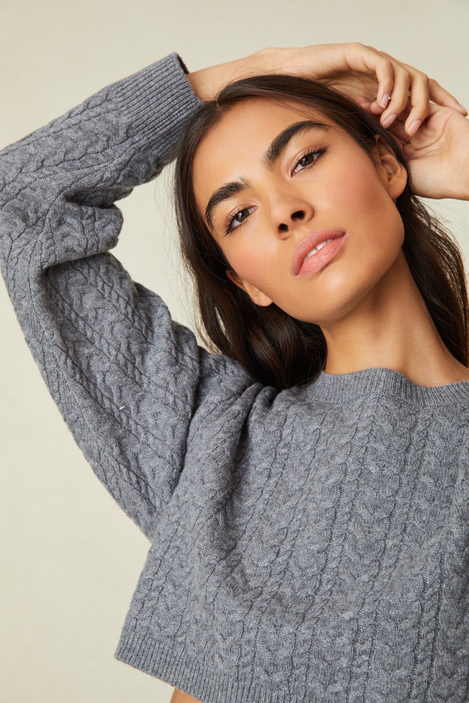 Crew Neck Cashmere Blend Sweater with long blouson sleeves and a cropped hem.
