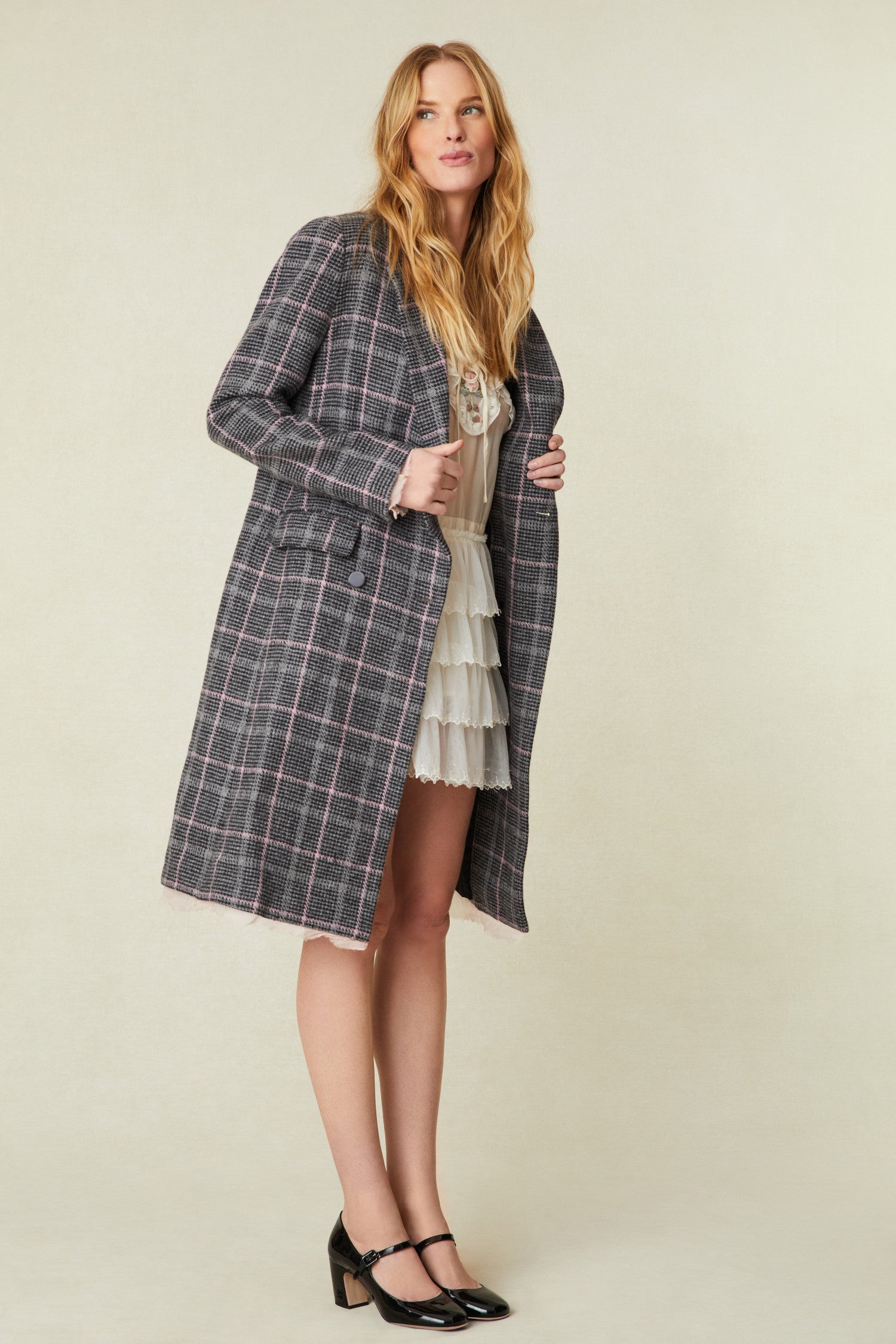 Double breasted grey plaid and pink print coat.
