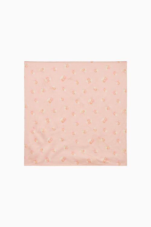 Pink square scarf fabric with subtle pattern on a white background