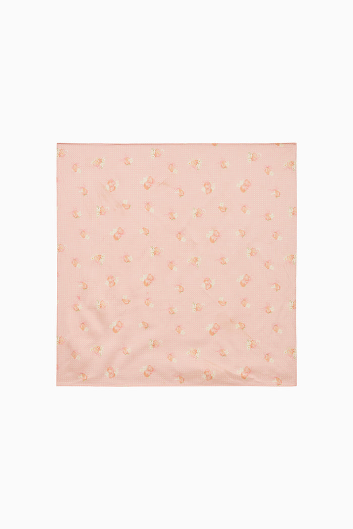 Pink square scarf fabric with subtle pattern on a white background