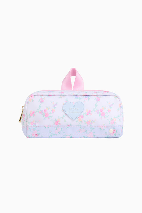 Cosmetic bag with heart design and pink handle on a white background