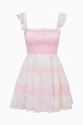 Pink and white dress with ruffled sleeves on a white background