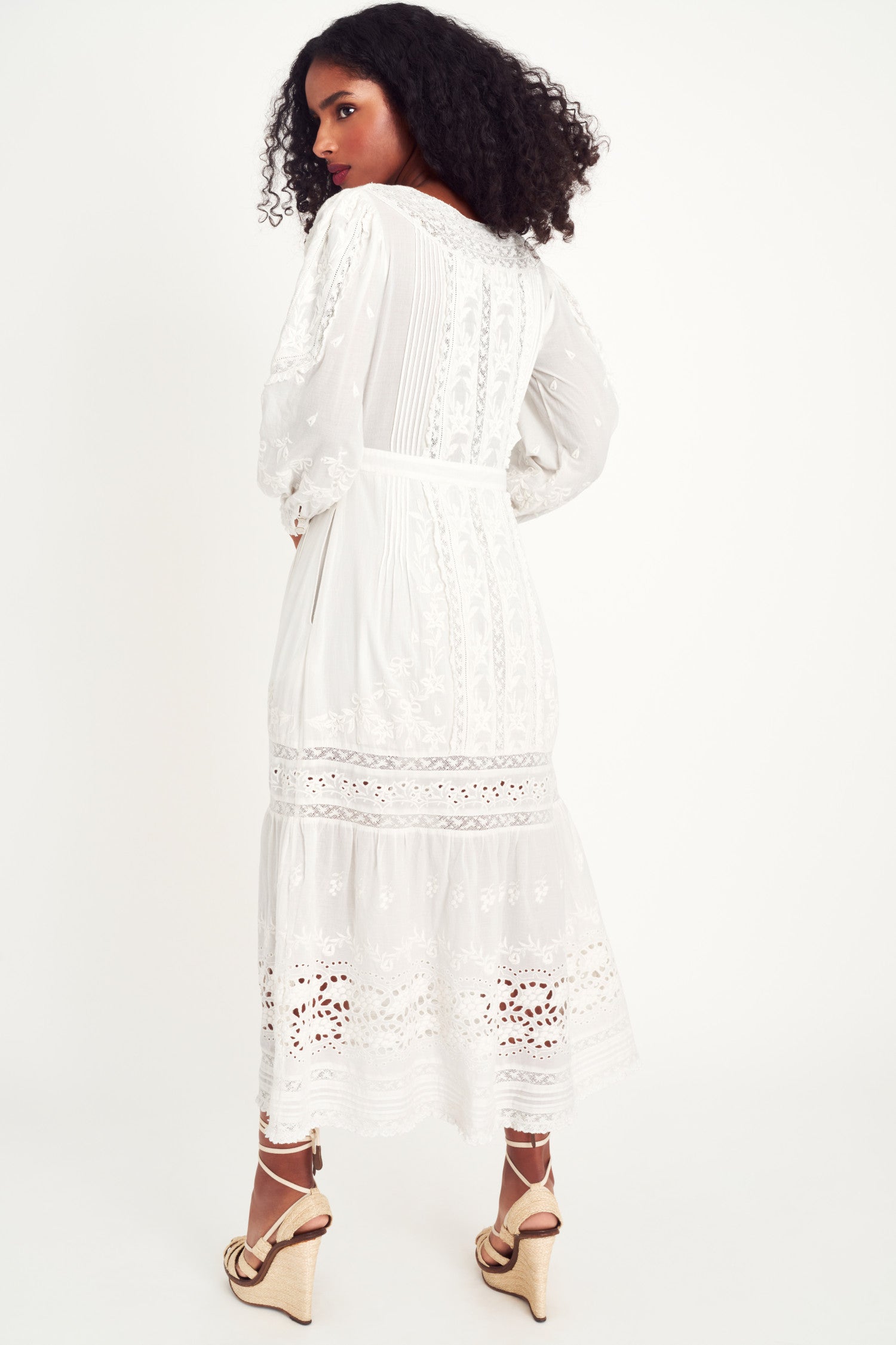 Back image of model wearing white maxi dress