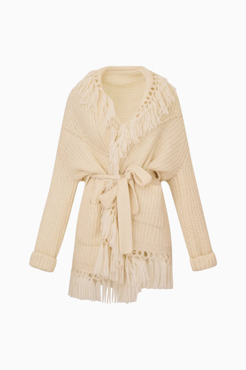 Beige cardigan with fringe details on a white background