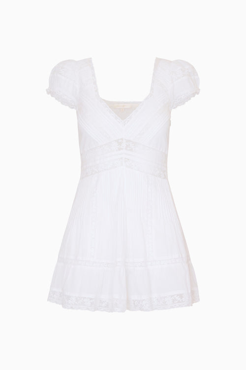 White dress with lace details on a white background