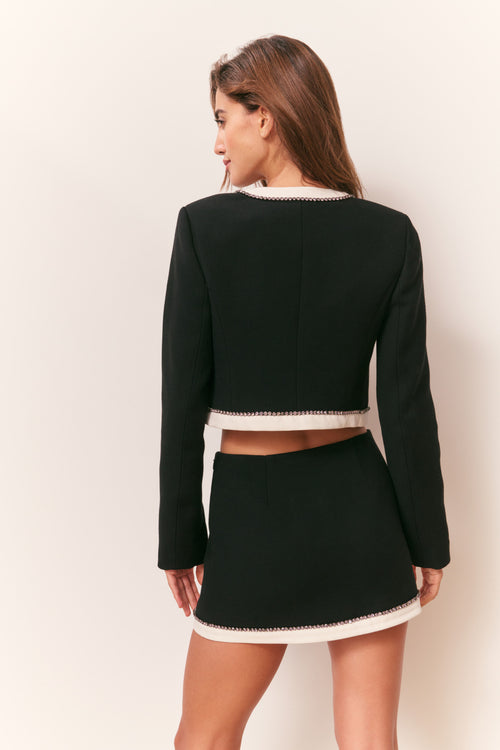 Edeness Bow Embellished Mini Skirt