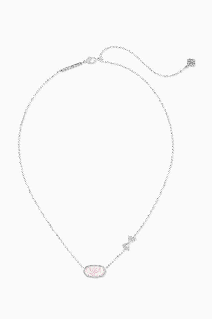 Necklace with a pink pendant and star-shaped charms on a white background