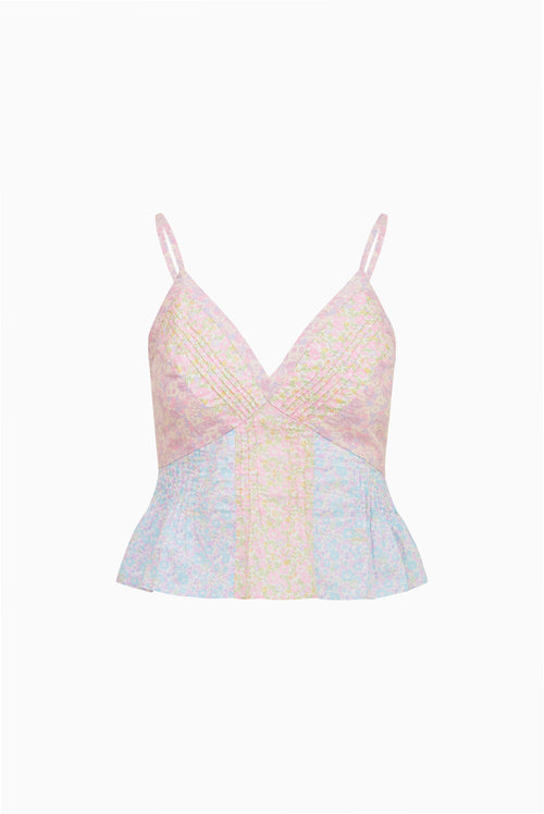Pastel-colored lace sleeveles top on a white background