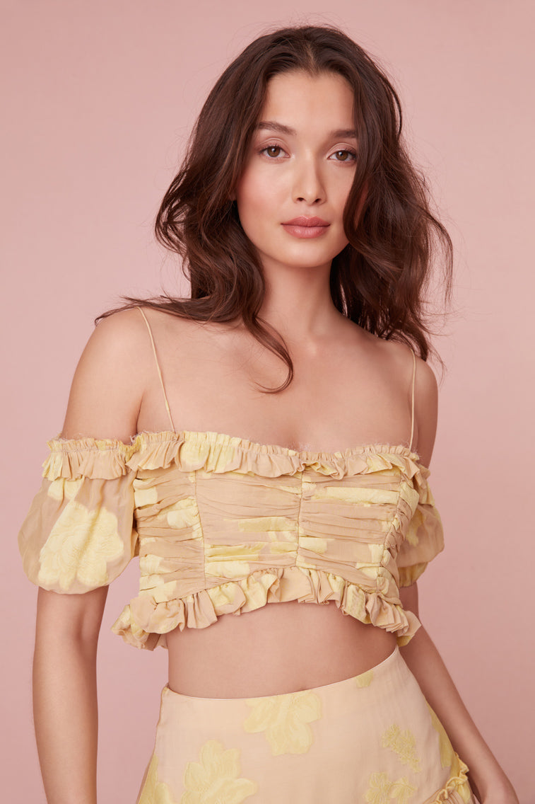 Cropped off-shoulder made from soft fil coupe silk blend with a custom floral design