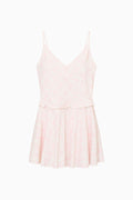 Light pink slip dress on a white background