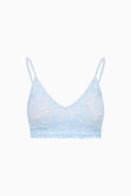 Light blue bralette on a white background