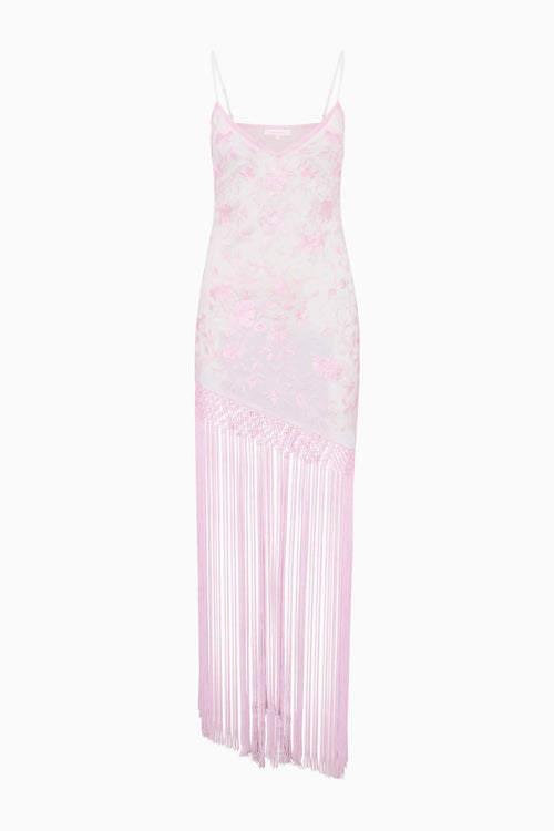 Pink dress with fringe skirt on a white background