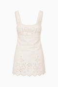 White lace eyelet dress on a white background