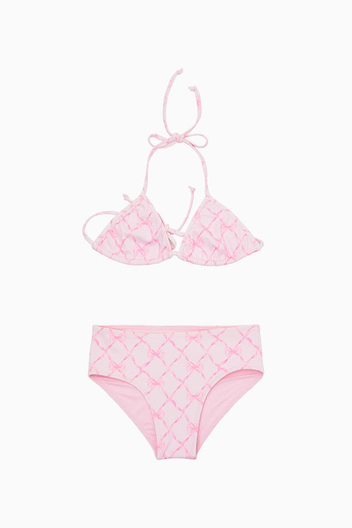 Pink bikini set with lattice bow pattern on a white background