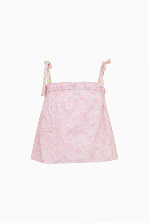 Pink floral top with thin straps on a white background