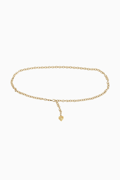 Gold chain belt with a small heart charm on a white background