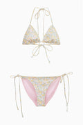 Floral bikini set with floral yellow and blue print on a white background