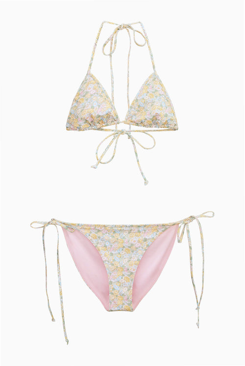 Floral bikini set with floral yellow and blue print on a white background