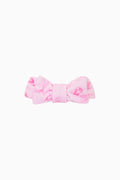 Pink bow on a white background