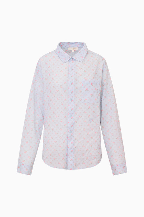 White shirt with subtle floral pattern on a white background