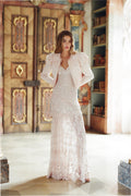Blush sequin lace dress with V-neck and flowing tiered maxi skirt