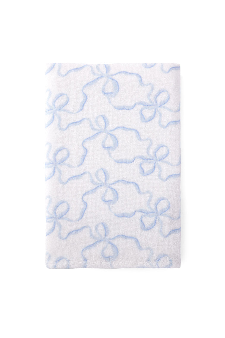 Hand towel with a bow print.