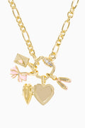 Gold necklace with heart-shaped pendants and a pink bow on a white background