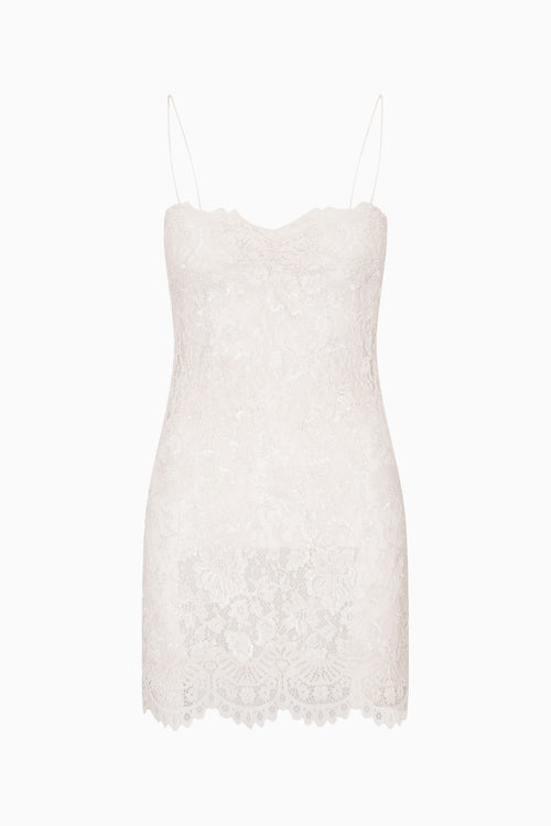 White sleeveless dress with lace pattern on a white background