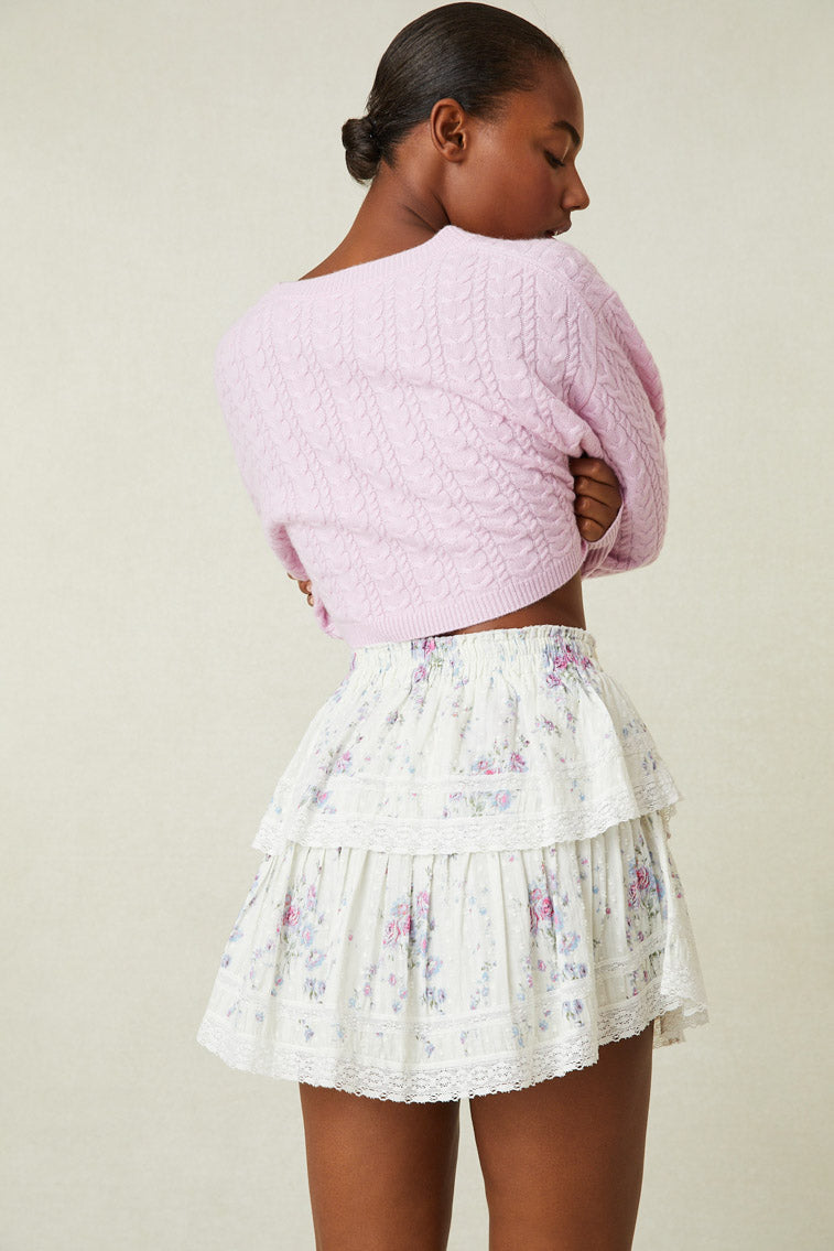 Back image of model wearing pink cable knit crop sweater